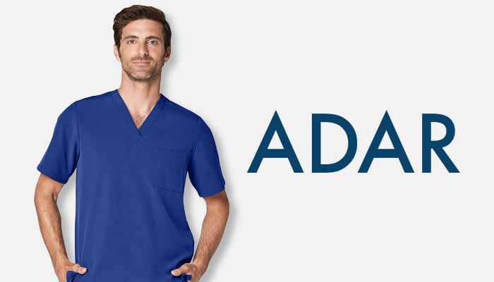 Man wearing blue Adar scrubs