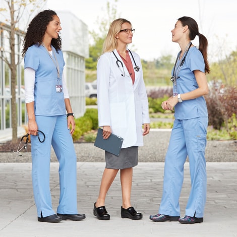 Medical professionals wearing slip resistant shoes