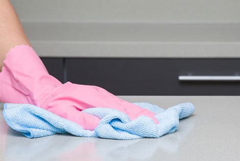 Disinfecting hard surface before cleaning nursing bag