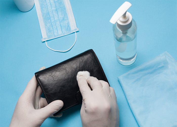 disinfecting purse to prevent spread of infection