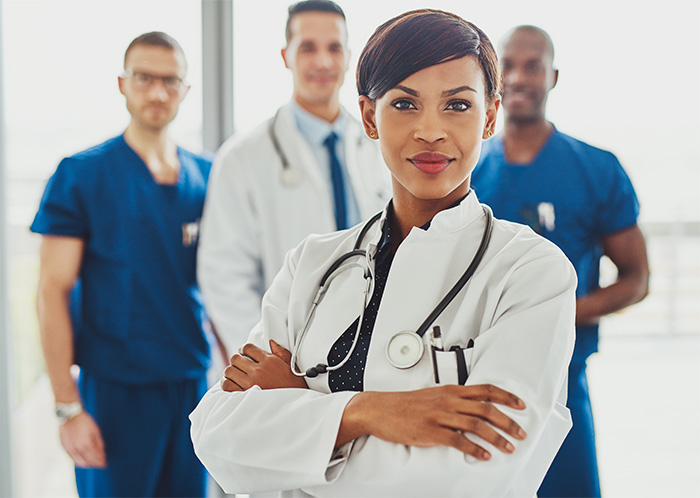 black female chief nursing officer in white lab coat