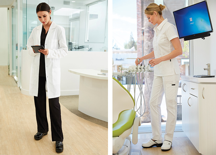 female medical professionals standing wearing clogs