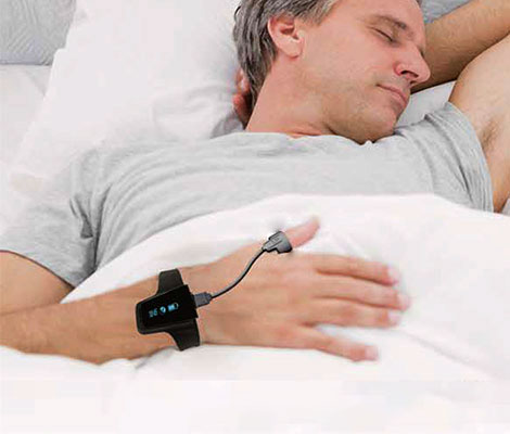 Man wearing BodiMetrics Sleep and Fitness Monitor