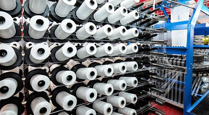 Rolls of thread inside textile factory