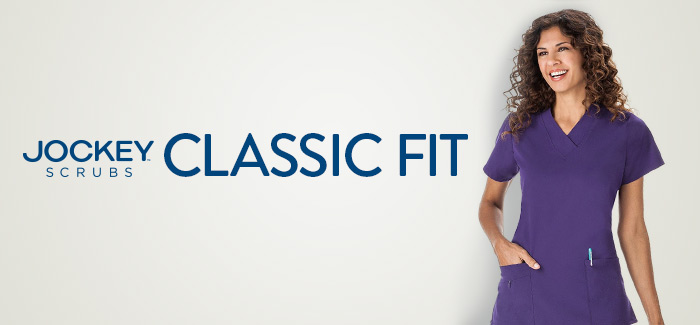 Woman wearing purple Classic Fit Jockey® scrubs